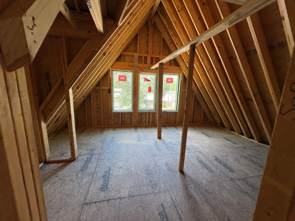Attic framing in a new Select Build home before insulation and drywall