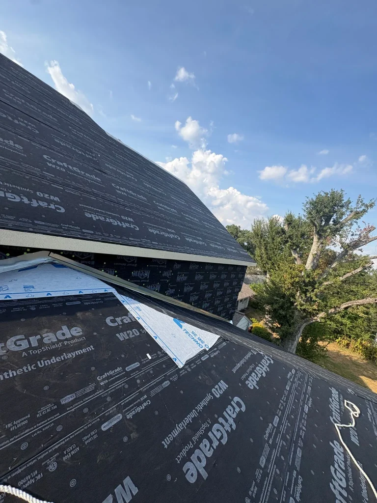 Roof and wall sheathing going on during construction of a Select Build new home
