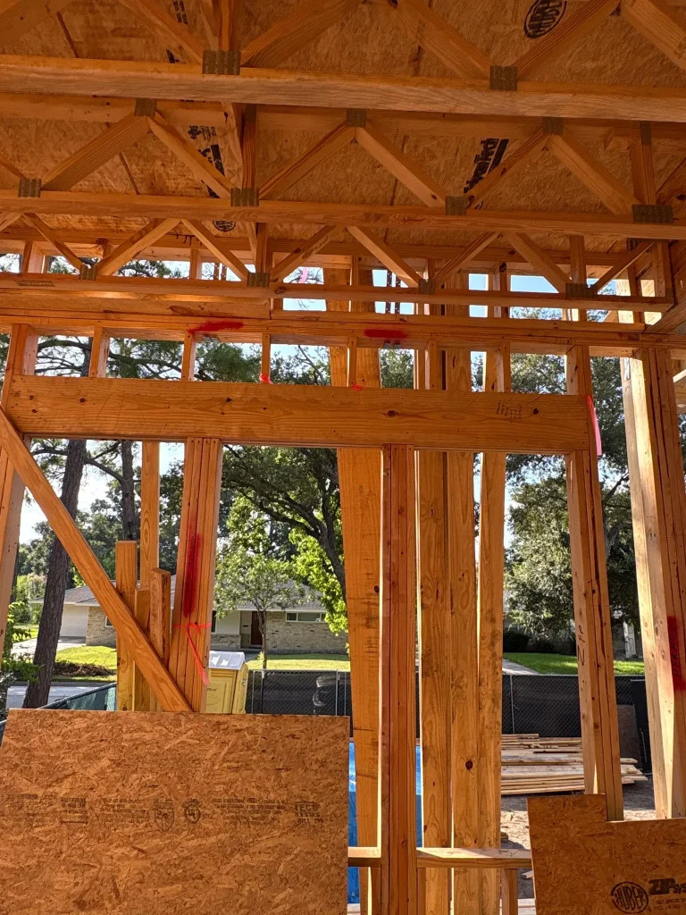 Second-floor framing with large window openings on the Westbury new build