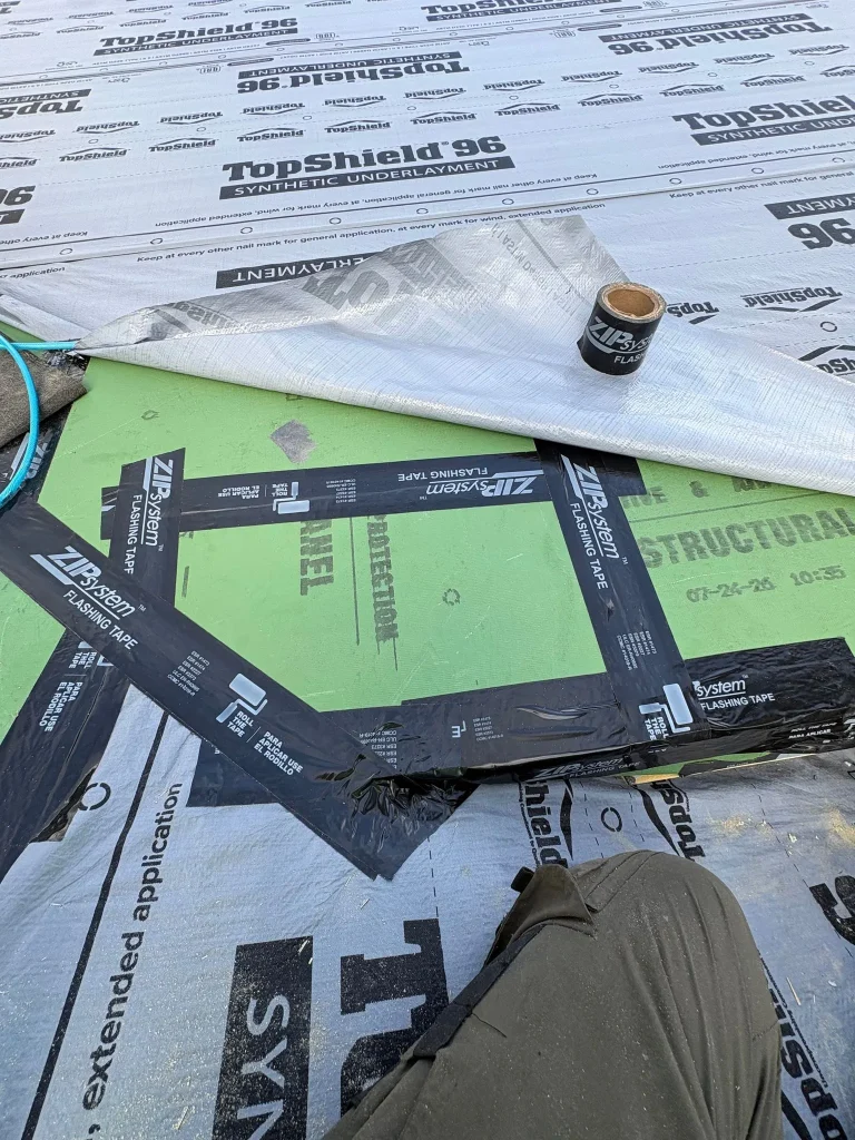 ZIP System wall sheathing with every seam taped to seal out air and water